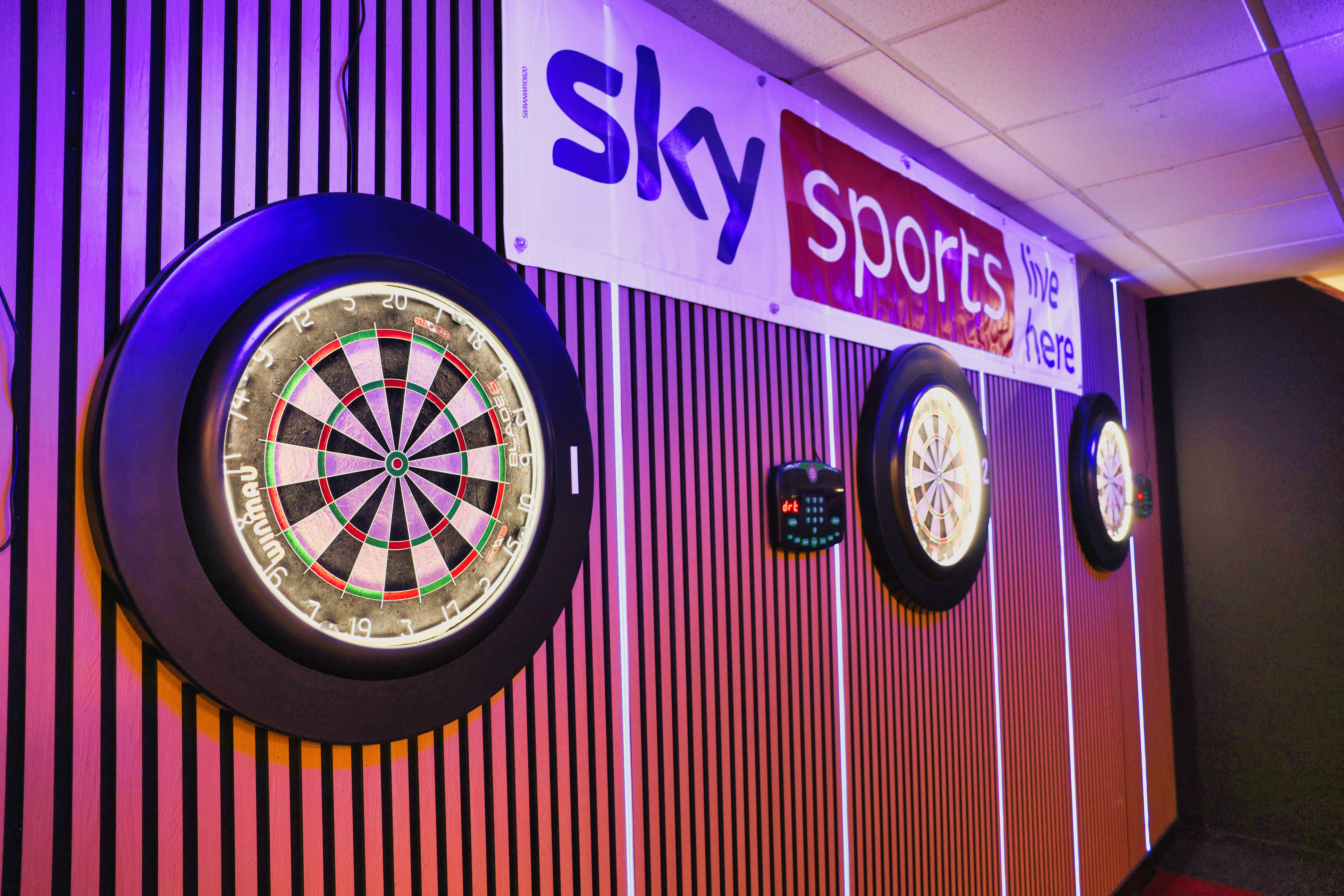 The dart lanes inside The 180 Lounge